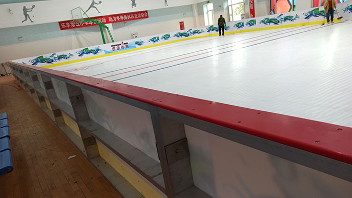 Synthetic ice rink fence